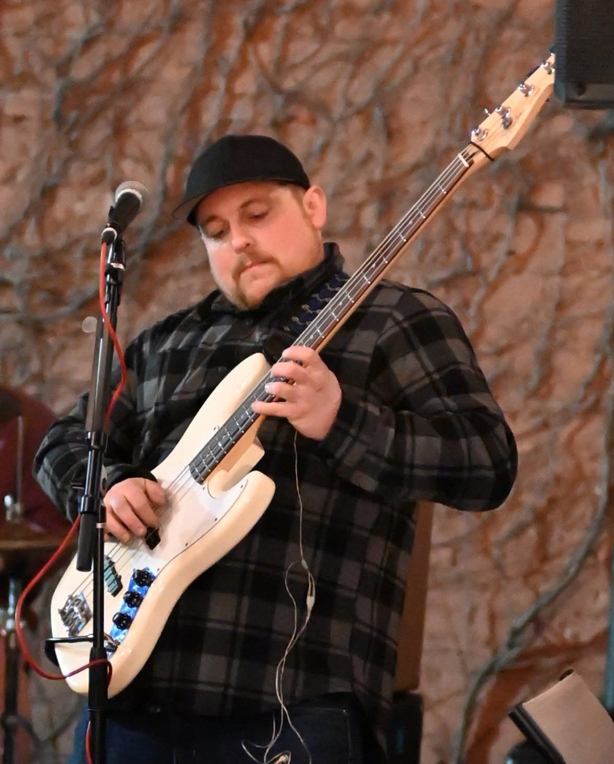 Ben Daw performing live on bass